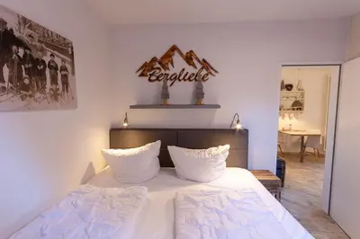 Ein Bett oder Betten in einem Zimmer der Unterkunft Kleine Bergsuite mit Terrasse