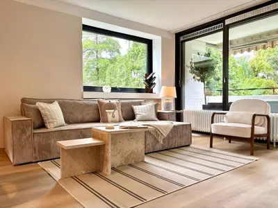 Ein Sitzbereich in der Unterkunft HyggeLiving - DELUXE - 90qm - Balkon - Gartenblick - 55 Zoll TV - Boxspringbetten - Hunde - Kinder - Fahrradkeller