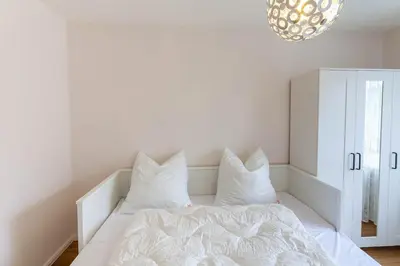 Ein Bett oder Betten in einem Zimmer der Unterkunft Ferienwohnung Bergfreude mit Balkon