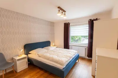 Ein Bett oder Betten in einem Zimmer der Unterkunft Ferienwohnung Bergfreude mit Balkon