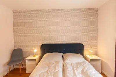 Ein Bett oder Betten in einem Zimmer der Unterkunft Ferienwohnung Bergfreude mit Balkon