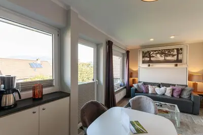 Ein Sitzbereich in der Unterkunft Ferienwohnung Harzlaune mit Balkon und Wurmbergblick