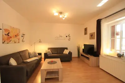Ein Sitzbereich in der Unterkunft Ferienwohnung Kortum mit Balkon