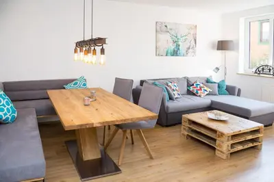 Ein Sitzbereich in der Unterkunft Ferienwohnung Oberharzer Bergluft mit Balkon