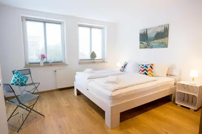 Ein Bett oder Betten in einem Zimmer der Unterkunft Ferienwohnung Oberharzer Bergluft mit Balkon