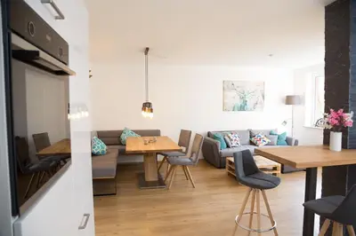 Ein Sitzbereich in der Unterkunft Ferienwohnung Oberharzer Bergluft mit Balkon