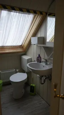 Ein Badezimmer in der Unterkunft Pension im Glück Thale