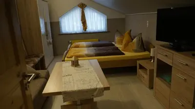 Ein Bett oder Betten in einem Zimmer der Unterkunft Pension im Glück Thale