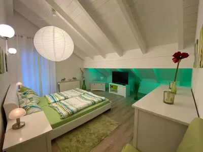 Ein Bett oder Betten in einem Zimmer der Unterkunft Ferienkomfortwohnung Walter