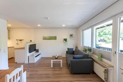 Ein Sitzbereich in der Unterkunft Ferienwohnung Bergkristall mit Balkon