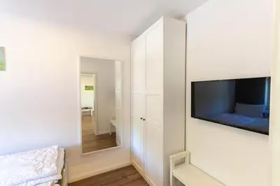 Ein Bett oder Betten in einem Zimmer der Unterkunft Ferienwohnung Bergkristall mit Balkon