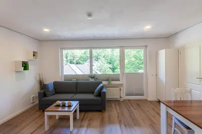 Ein Sitzbereich in der Unterkunft Ferienwohnung Bergkristall mit Balkon
