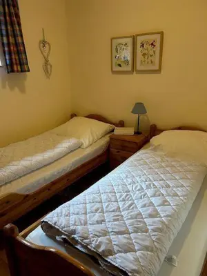 Ein Bett oder Betten in einem Zimmer der Unterkunft Ferienwohnung Kleine Auszeit