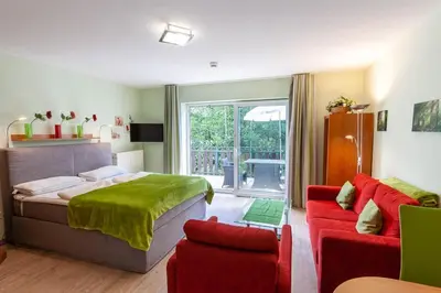 Ein Bett oder Betten in einem Zimmer der Unterkunft Apartment an der Wurmbergseilbahn mit Balkon