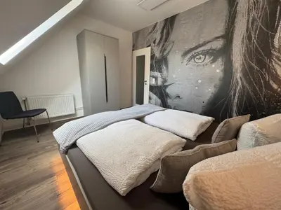 Ein Bett oder Betten in einem Zimmer der Unterkunft Stilapartment Oasis 2
