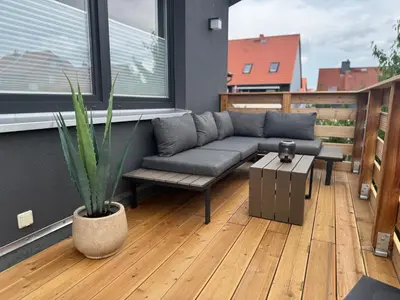 Ein Sitzbereich in der Unterkunft Stilapartment Oasis 2