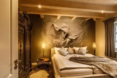 Ein Bett oder Betten in einem Zimmer der Unterkunft Landhaus Gutshaus