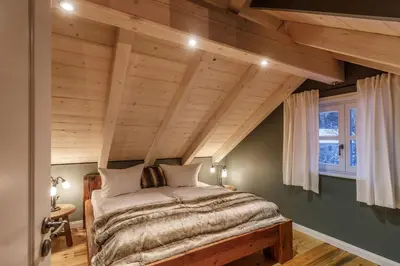 Ein Bett oder Betten in einem Zimmer der Unterkunft Landhaus Gutshaus