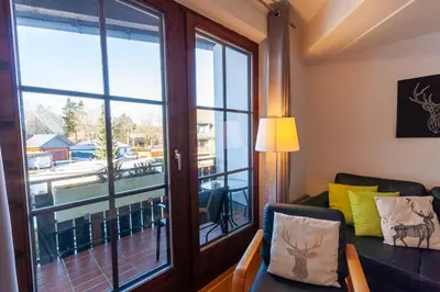 Ein Sitzbereich in der Unterkunft Ferienwohnung Bergblick mit Balkon
