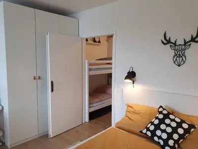 Ein Bett oder Betten in einem Zimmer der Unterkunft Lake Lodge am Kranichsee - Hahnenklee im Harz