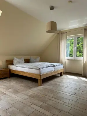Ein Bett oder Betten in einem Zimmer der Unterkunft Magdalena Apartments 5