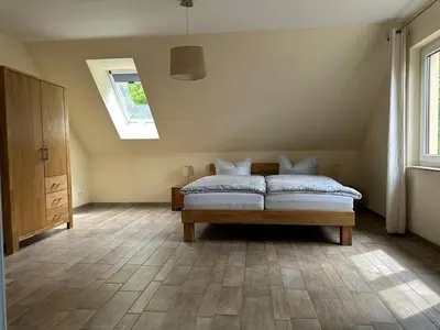 Ein Bett oder Betten in einem Zimmer der Unterkunft Magdalena Apartments 5