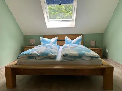 Ein Bett oder Betten in einem Zimmer der Unterkunft Magdalena Apartments 5