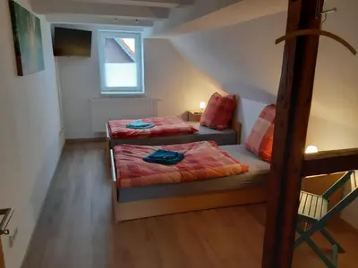 Ein Bett oder Betten in einem Zimmer der Unterkunft Ferienhaus LeBen