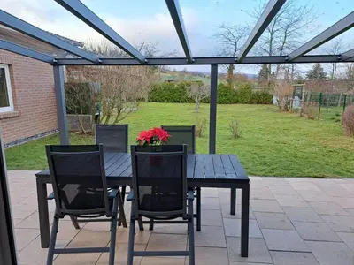 Ein Garten an der Unterkunft Ferienhaus LeBen