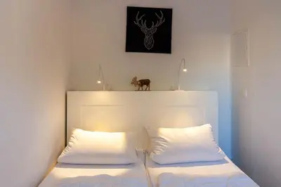 Ein Bett oder Betten in einem Zimmer der Unterkunft Ferienwohnung Verschnaufpause am Hasselkopflift
