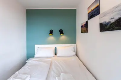 Ein Bett oder Betten in einem Zimmer der Unterkunft Apartment Gipfelblick mit Balkon