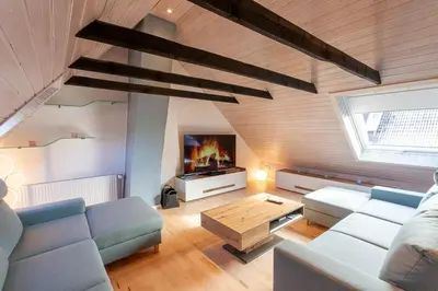 Ein Sitzbereich in der Unterkunft Ferienhaus Holzwurm