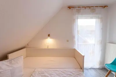 Ein Bett oder Betten in einem Zimmer der Unterkunft Ferienhaus Huckla