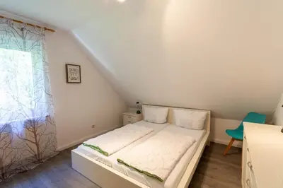 Ein Bett oder Betten in einem Zimmer der Unterkunft Ferienhaus Huckla