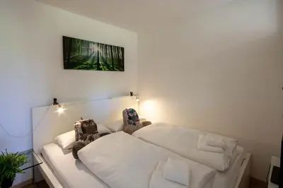 Ein Bett oder Betten in einem Zimmer der Unterkunft Ferienwohnung Bergzwerg am Hasselkopflift