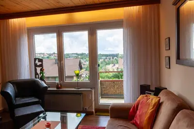 Ein Sitzbereich in der Unterkunft Ferienwohnung Carpe Diem mit Balkon