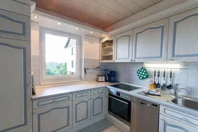 Küche/Küchenzeile in der Unterkunft Ferienwohnung Carpe Diem mit Balkon
