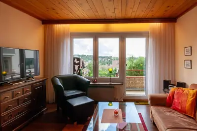 Ein Sitzbereich in der Unterkunft Ferienwohnung Carpe Diem mit Balkon