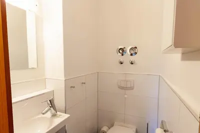 Ein Badezimmer in der Unterkunft Ferienwohnung Carpe Diem mit Balkon
