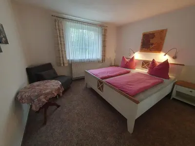 Ein Bett oder Betten in einem Zimmer der Unterkunft Ferienwohnung Wagner