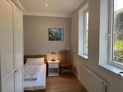 Ein Bett oder Betten in einem Zimmer der Unterkunft Ferienhaus Wäschegrund