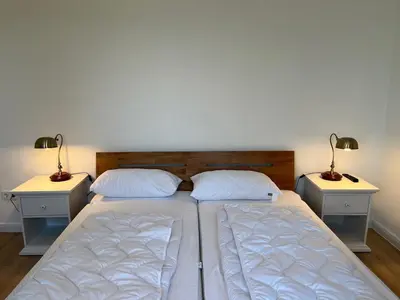 Ein Bett oder Betten in einem Zimmer der Unterkunft Ferienhaus Wäschegrund