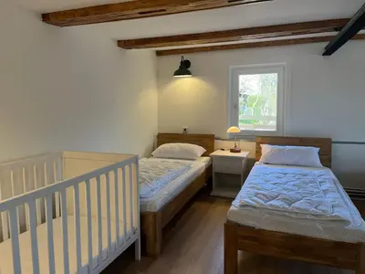 Ein Bett oder Betten in einem Zimmer der Unterkunft Ferienhaus Wäschegrund