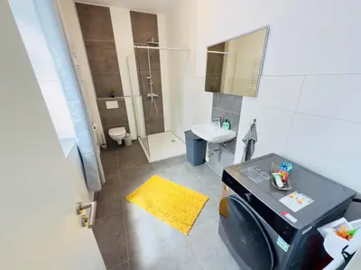 Ein Badezimmer in der Unterkunft TraumFeWo Harmonie in Seenähe mit Terrasse von Harztraveler