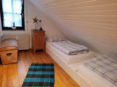 Ein Bett oder Betten in einem Zimmer der Unterkunft Ferienhaus Färber