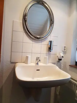 Ein Badezimmer in der Unterkunft Ferienhaus Färber