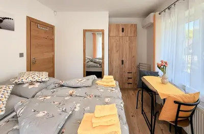 Ein Bett oder Betten in einem Zimmer der Unterkunft Villa Palmwiesen