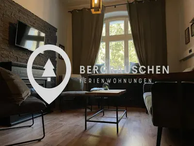 Ein Sitzbereich in der Unterkunft Bergrauschen-Waldbude in Goslar-Okertal im Harz inkl Wäsche