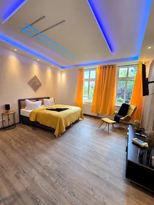 Ein Bett oder Betten in einem Zimmer der Unterkunft Stilvoll zu Hause mit Charme, bis zu 6 Personen