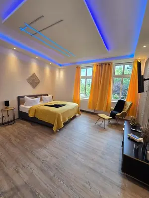 Ein Bett oder Betten in einem Zimmer der Unterkunft Stilvoll zu Hause mit Charme, bis zu 6 Personen